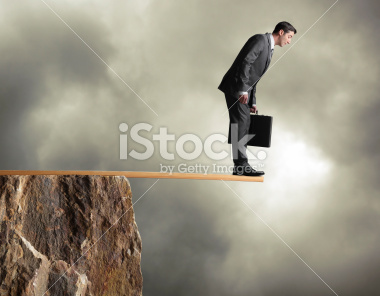 stock-photo-22238914-businessman-walking-the-plank